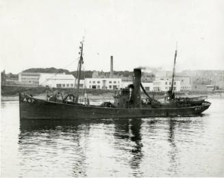 Black and white photograph Showing Port Side Of Trawler A47 'strathleven' Leaving Aberdeen Harbour