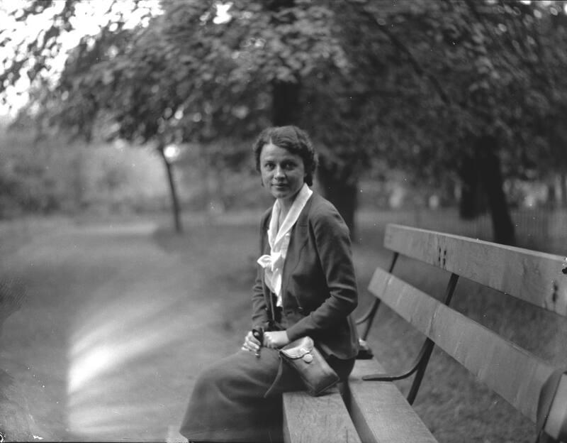 Woman Seated on Bench 