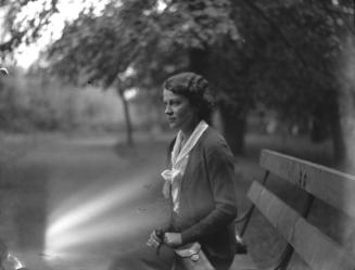 Woman Seated on Bench 