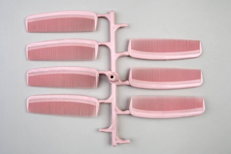 Seven Moulded "Nuroid" Combs as Taken from Moulding Machine