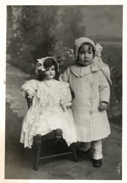 Photograph of Little Girl with Large Doll