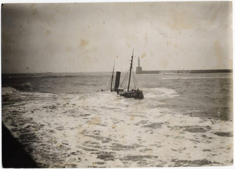 Black and white photograph Showing A Steam Trawler Wrecked At The North Pier