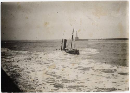 Black and white photograph Showing A Steam Trawler Wrecked At The North Pier