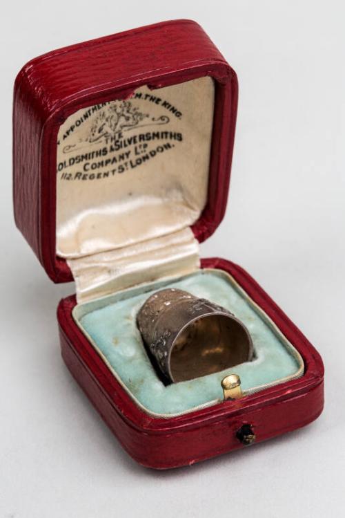 Thimble In Leather Case made by Henry Williamson Ltd.