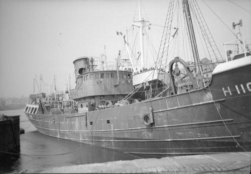 film negative showing an unidentified trawler at the quayside, Aberdeen Harbour