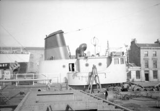 film negative showing the wheelhouse and funnel of an unidentified trawler at Aberdeen Harbour,…