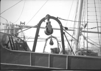 film negative showing a close up view of the gallows frame of an unidentified trawler
