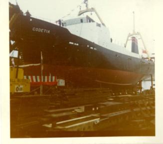 Colour photograph showing port side view of trawler 'godetia' just prior to launch