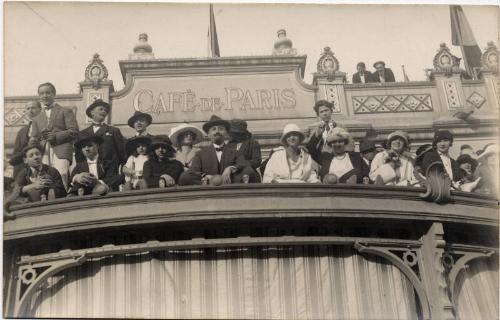 People gathered outside Cafe de Paris 