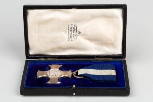 Distinguished Service Cross Medal and case, awarded to Horace Edward Nutten RNR