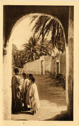 Group of young boys in archway (Tolga) 