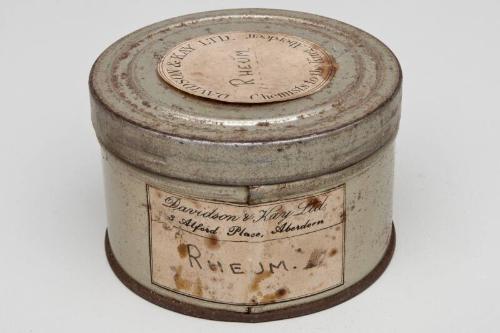 Circular Storage Tin Labelled RHEUM.