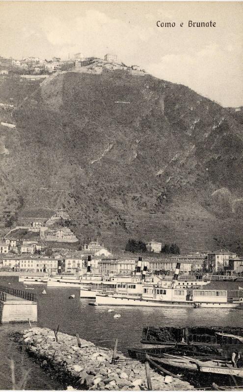 View of boats on water with mountains in the background (Como e Bruante)