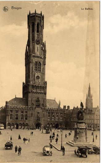 Bruges - View of bell tower and square in front with statue 