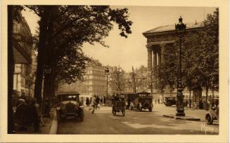 Paris - Street scene of Madeleine boulevard and church 