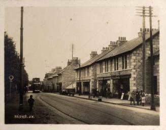 Black and white photograph Showing Cults High Street