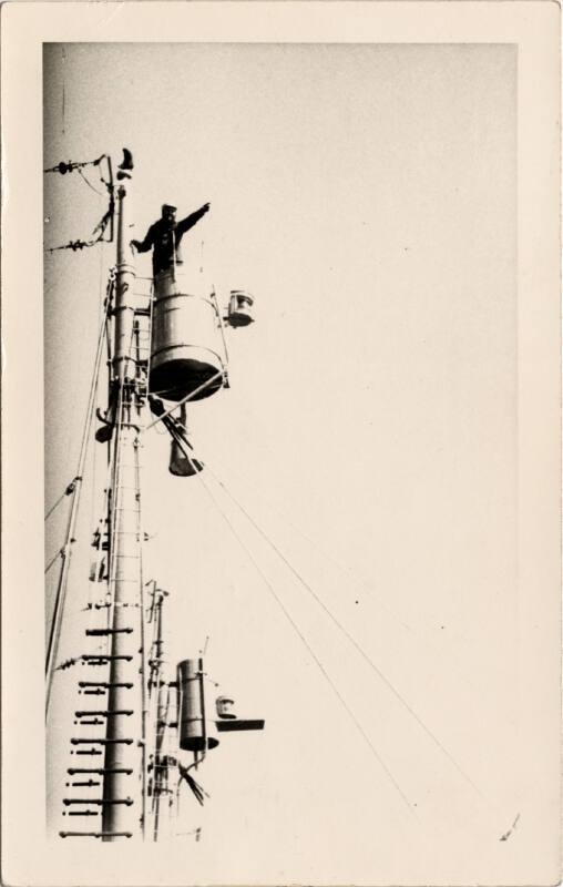 Black and white photograph of whaling scene "crow's nest. whale sighted"