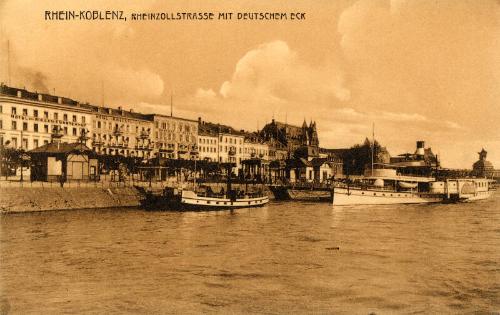 Coblenz - View of boats on the River Rhine with town in the background