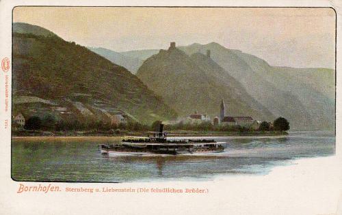 Bornhofen - View of boat on river with hills in background 