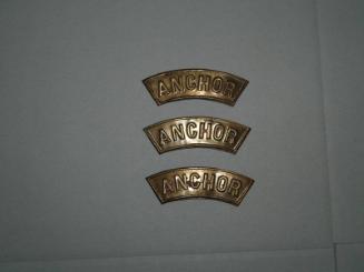 Impressed brass plate for trawl lamp reading 'anchor'