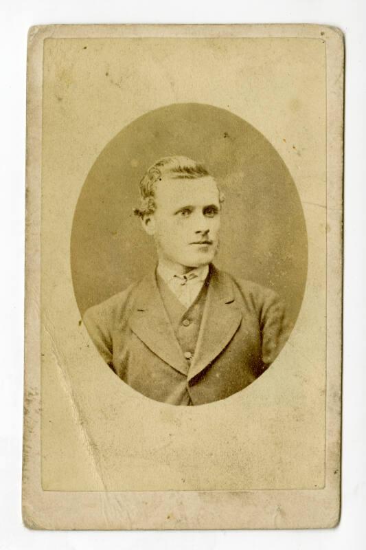 Head and shoulders of young man in an oval