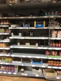 Digital Photograph Showing Empty Supermarket Shelves