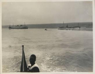 31. Arrival of Carnarvon Castle in Lobito Bay HMS Daffodil right of photo