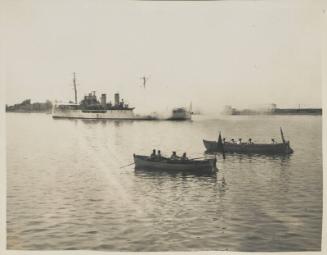 30b. HMS Delphinium fires a Royal Salute on arrival of Carnarvon Castle at Lobito