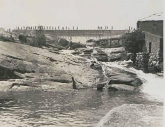 85. Quando Dam. Photo shows the falls of the River Quando and the dam partly built