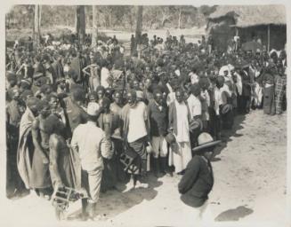 100. Natives at [Teixeira de Souga] on arrival of Special