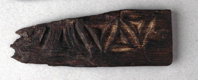 Fragment of carved wood from casket or furniture