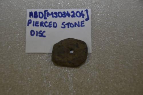 Pierced Stone Disc