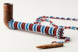 Pondo woman's pipe with beaded neck strap