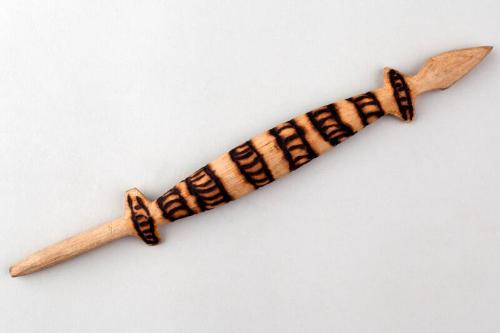 Carved wooden crocodile figure with design burnt on