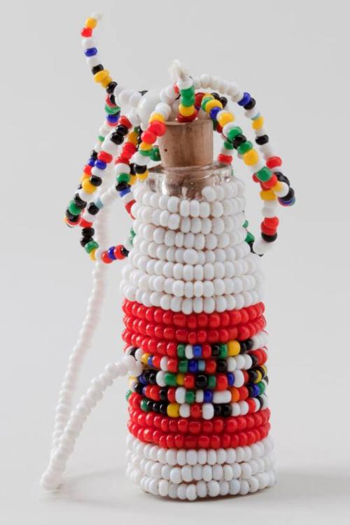 Minature bottle covered with beads