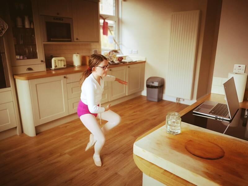 Young girl doing Zoom ballet class