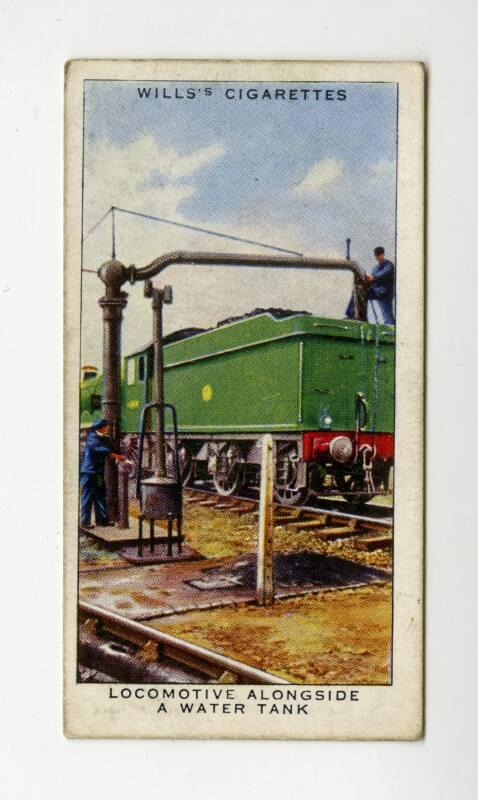 Railway Equipment Series: No.7 Locomotive Alongside A Water Tank