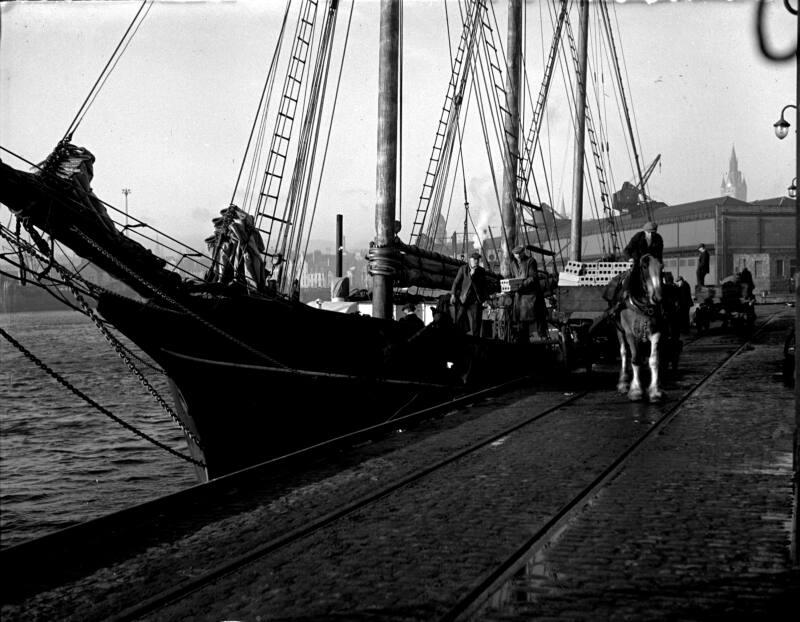 Loading Cargo on Sailing Ship