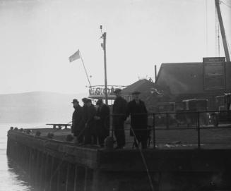 Fishing Off Quay At Aberdeen Harbour