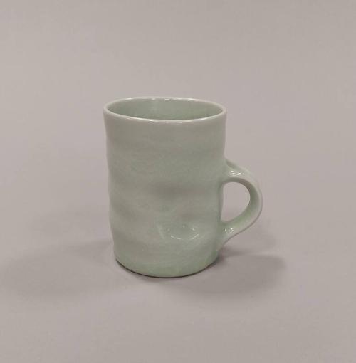 Porcelain Mug with Squashed Sides and Celadon Glaze