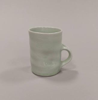 Porcelain Mug with Squashed Sides and Celadon Glaze