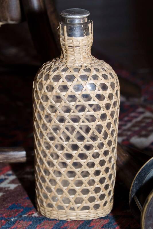 Glass Flask In Wicker Type Material