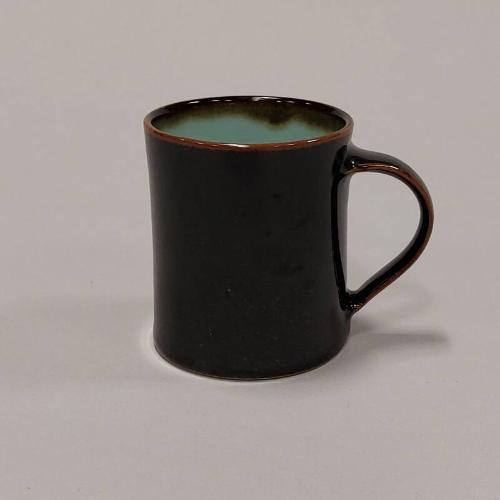 Porcelain Mug with Tenmoku and Celadon Glazes