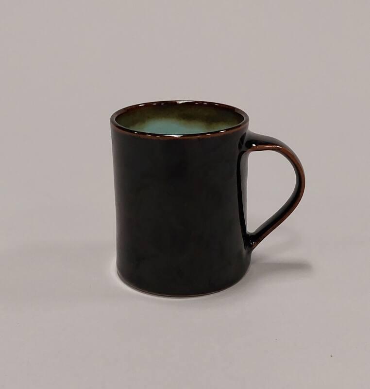 Porcelain Mug with Tenmoku and Celadon Glazes