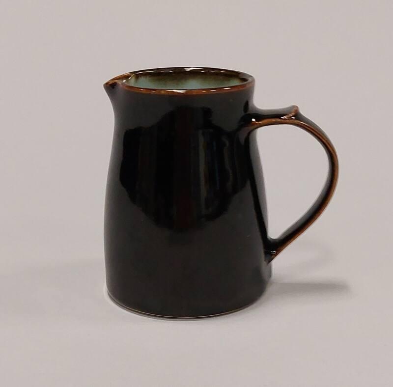 Porcelain Jug with Tenmoku and Celadon Glazes