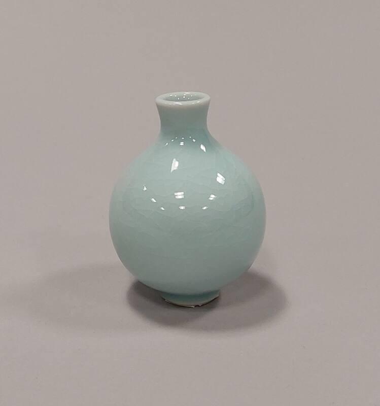 Porcelain Small Globe Vase