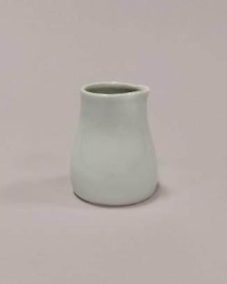 Porcelain Pourer with Squeezed Body and Celadon Glaze