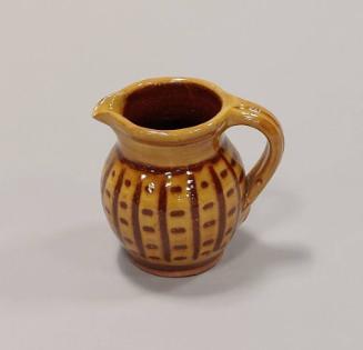 Earthenware Small Jug with Brown Pattern over Yellow Slip