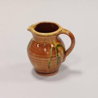 Earthenware Small Jug with Yellow, Green and Brown Glazes