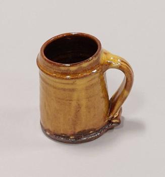 Earthenware Small Tankard with Yellow and Brown Mottled Glaze